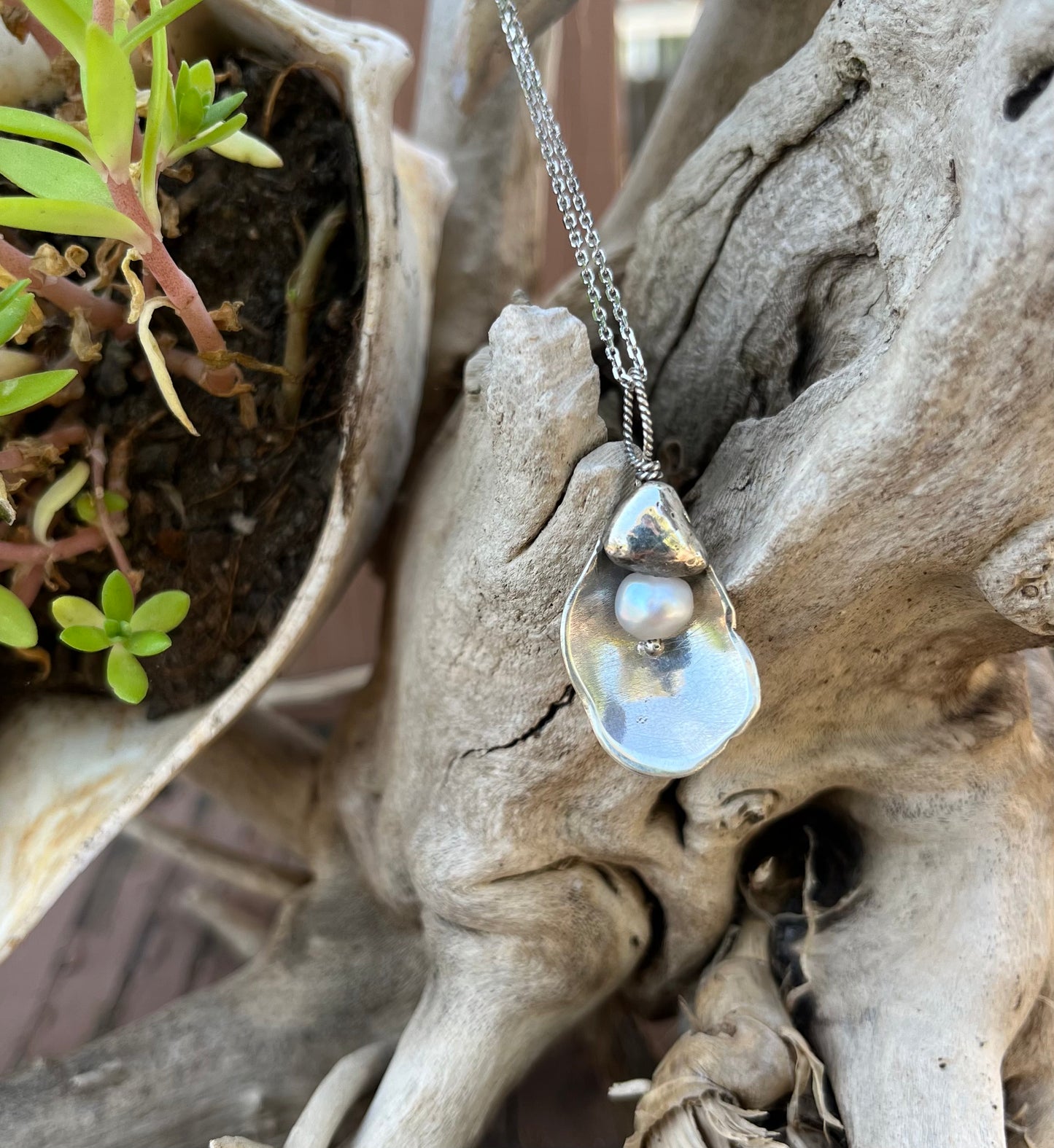 Oyster with Pearl Pendant