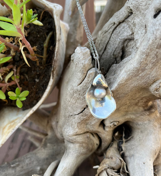 Oyster with Pearl Pendant